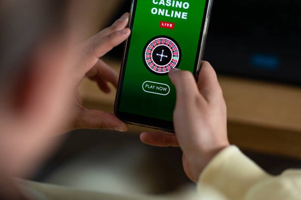 kahooy iOS Web interface showing slot games and account dashboard on iPhone
